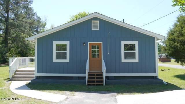 29 Dolly Lane Macon, GA 31217 - Photo 2 of 16 a front view of a house with garden
