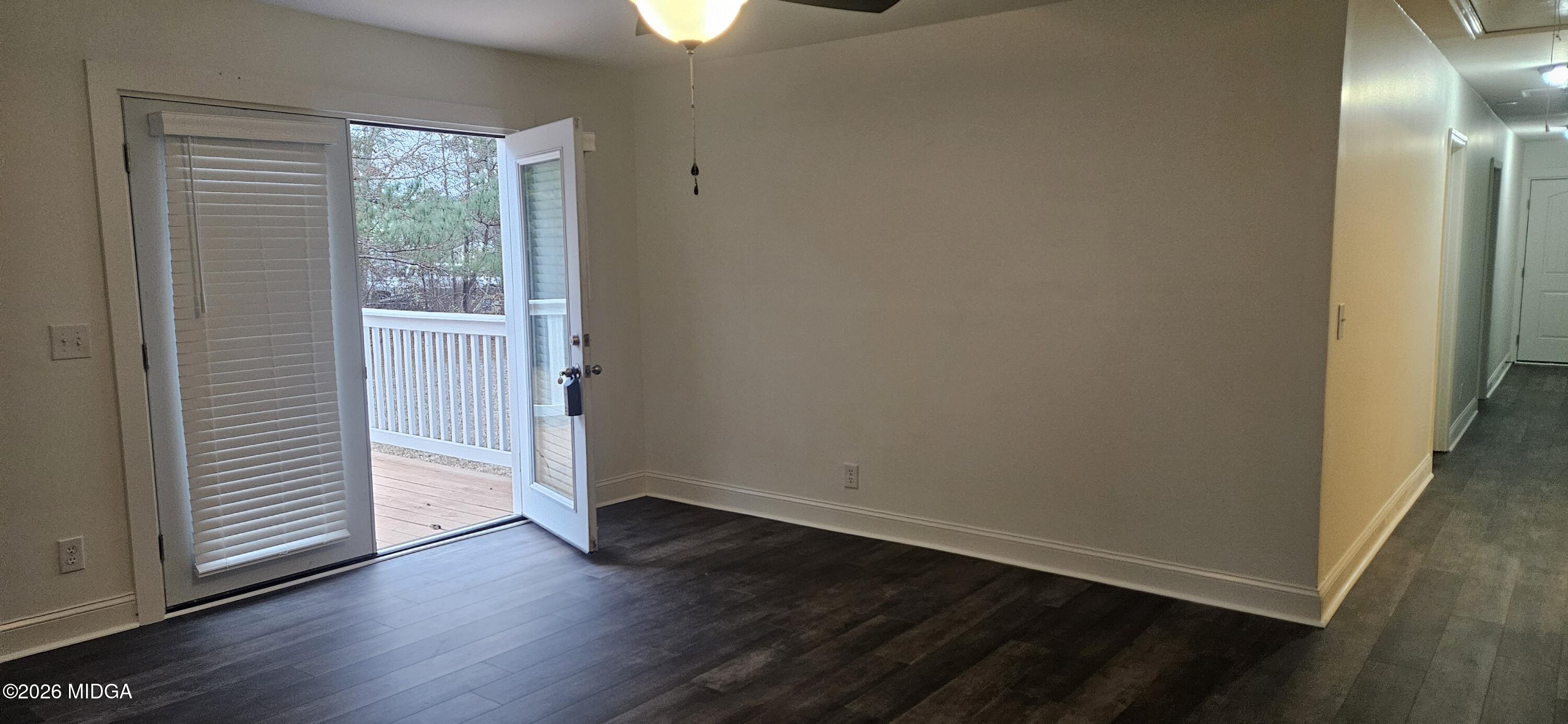 29 Dolly Lane Macon, GA 31217 - Photo 5 of 16 an empty room with wooden floor closet and windows