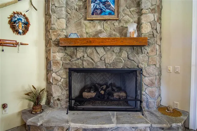 a view of a house with backyard sitting area and garden