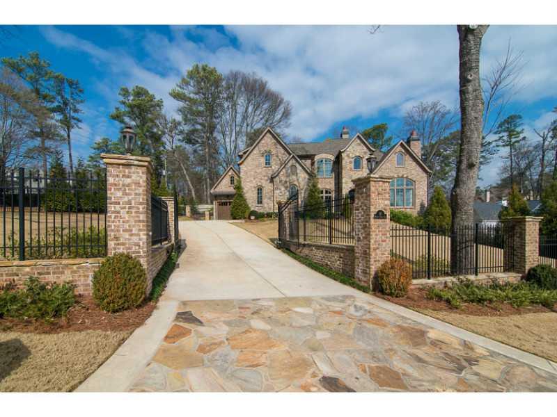 85 Mt Paran Road Northeast Atlanta, GA 30342 - Photo 1 of 1 Facade/Exterior Front. Gated and secured entrance with gorgeous brick and wrought iron fencing around entire perimeter of home. Complete with irrigation system and copper landscaping lighting.