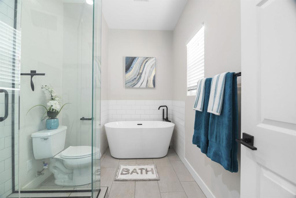 178 Elder Avenue Imperial Beach, CA 91932 - Photo 12 of 26 a bathroom with a toilet a sink and bathtub