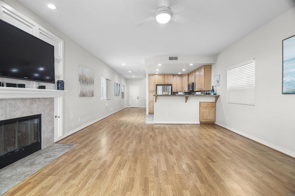 178 Elder Avenue Imperial Beach, CA 91932 - Photo 4 of 26 a view of a kitchen with a sink a kitchen a window and a fireplace