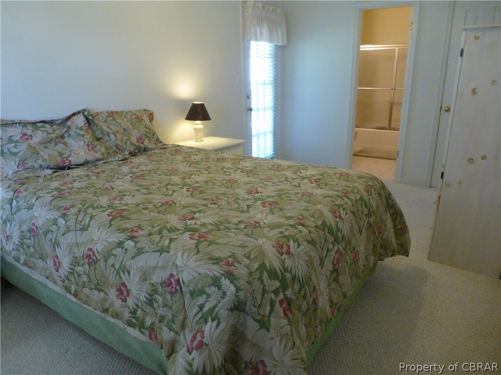 464 Jackson Creek Road Deltaville, VA 23043 - Photo 14 of 26 Another view of master bedroom and bath