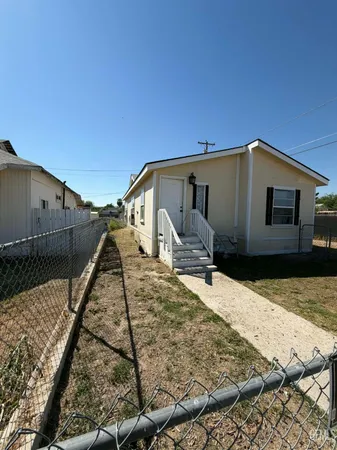 a front view of a house with outer view
