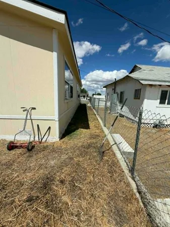 a house view with a backyard space