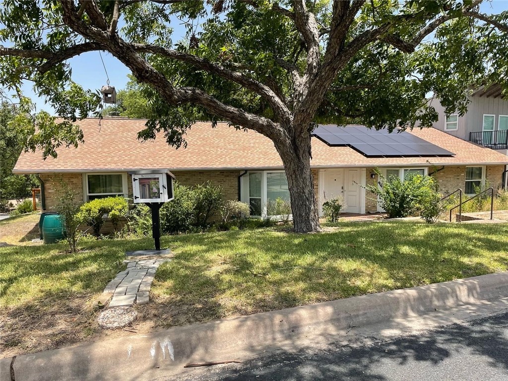 1706 Windoak Drive Austin, TX 78741 - Photo 1 of 1 a front view of a house with a yard