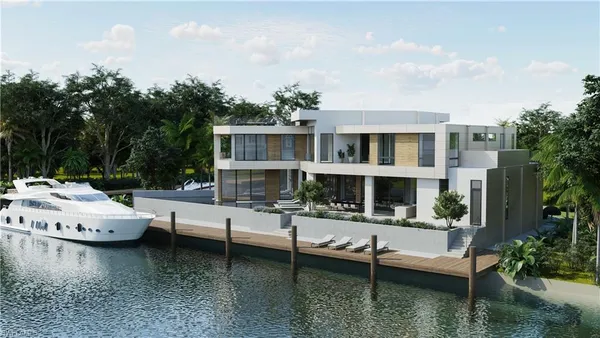 a view of a house with swimming pool and sitting area