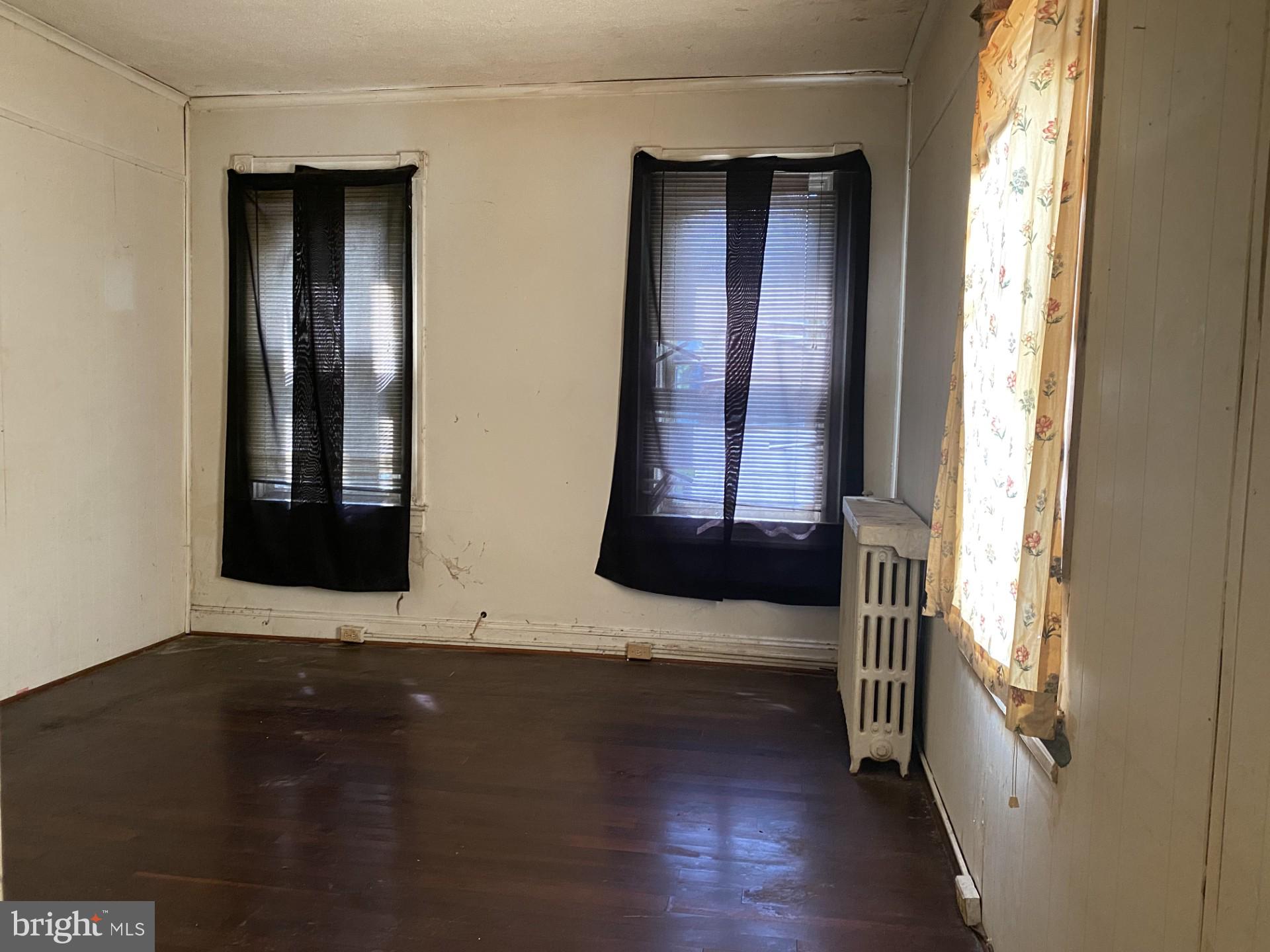 2802 Mosher Street Baltimore, MD 21216 - Photo 5 of 6 an entryway with a window