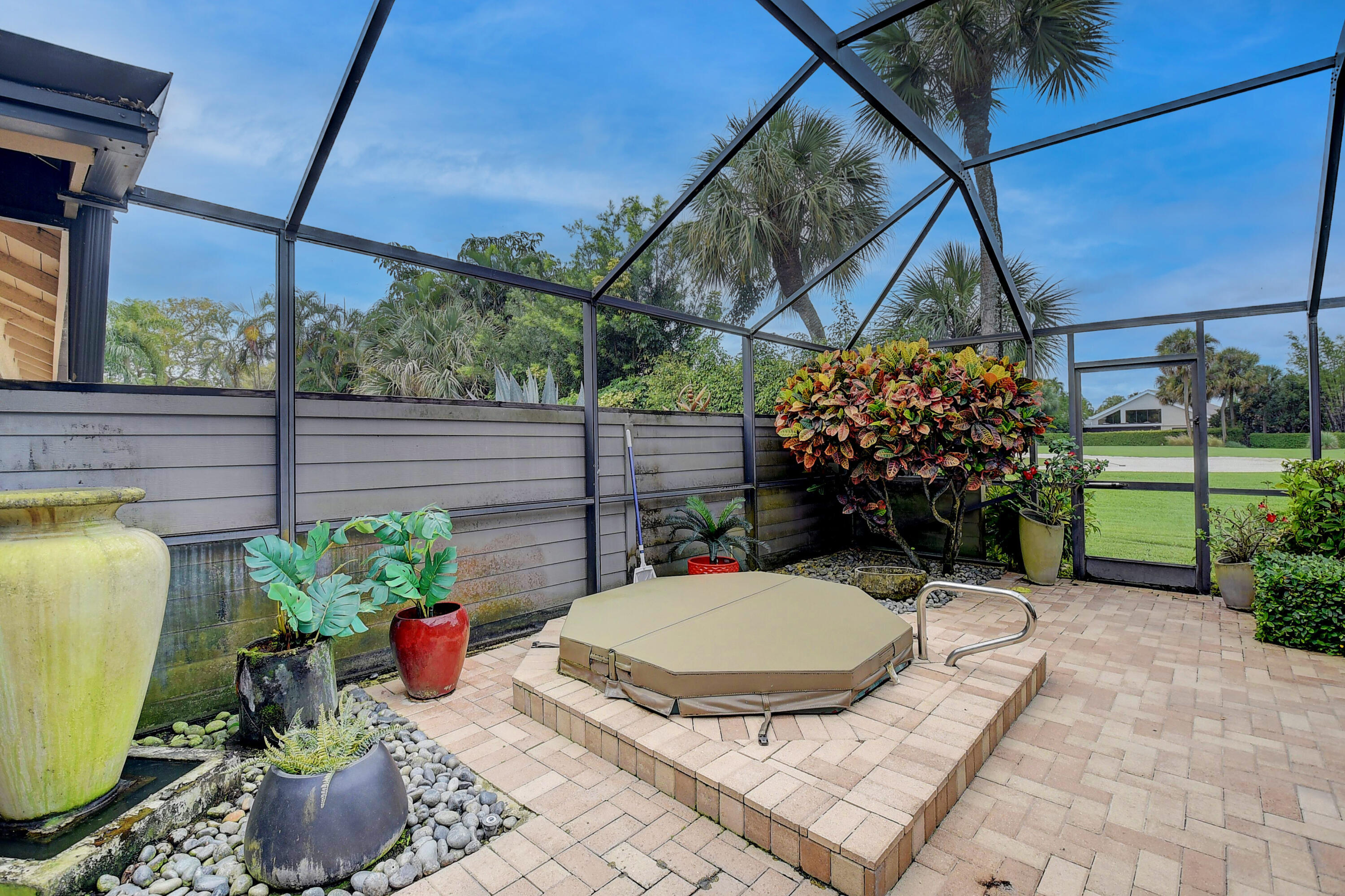 19489 Waters Court, Unit 103 Boca Raton, FL 33434 - Photo 36 of 89 jacuzzi in backyard