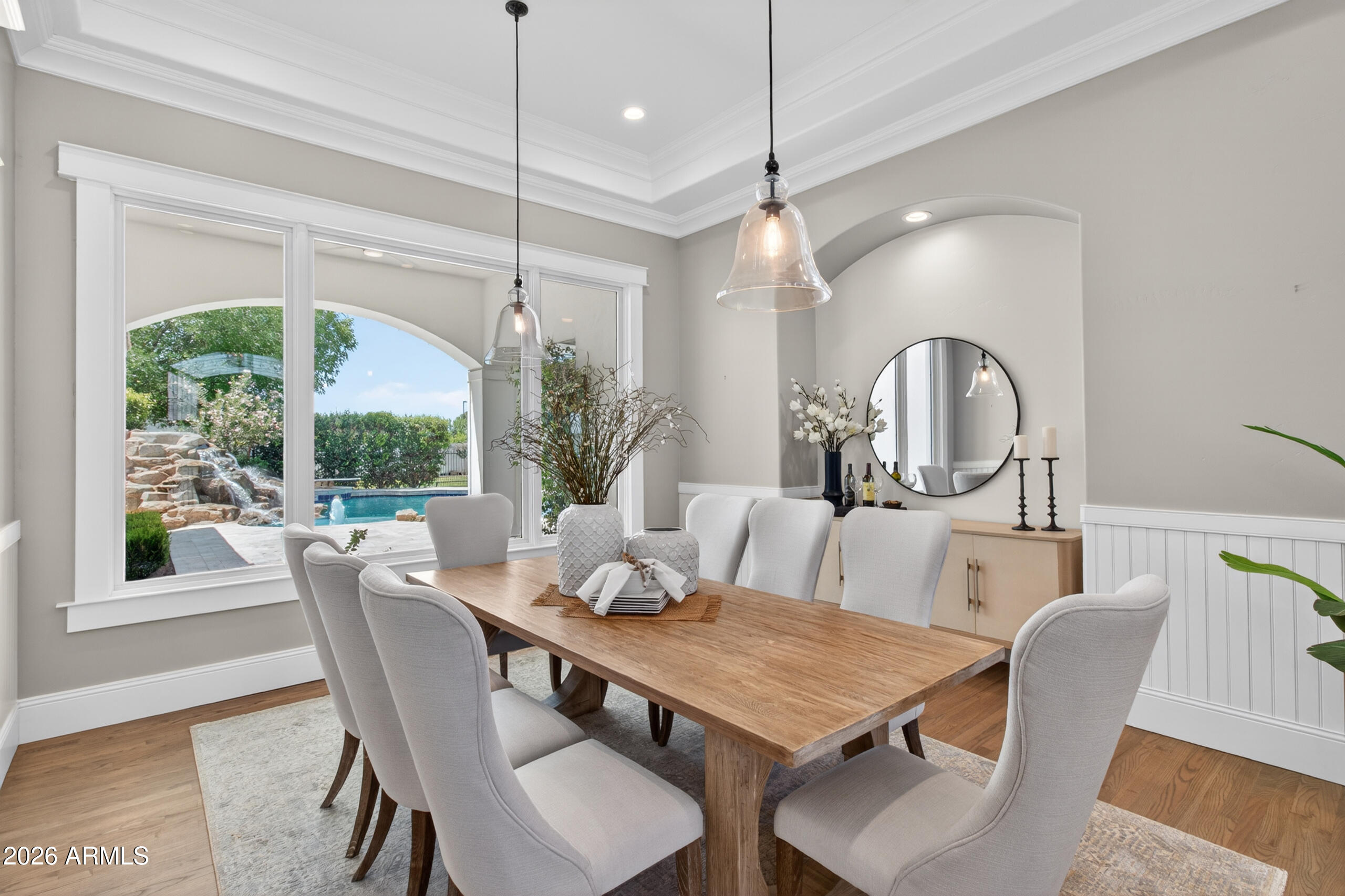 2677 East Queen Creek Road Gilbert, AZ 85297 - Photo 19 of 128 a dining room with furniture a chandelier and window