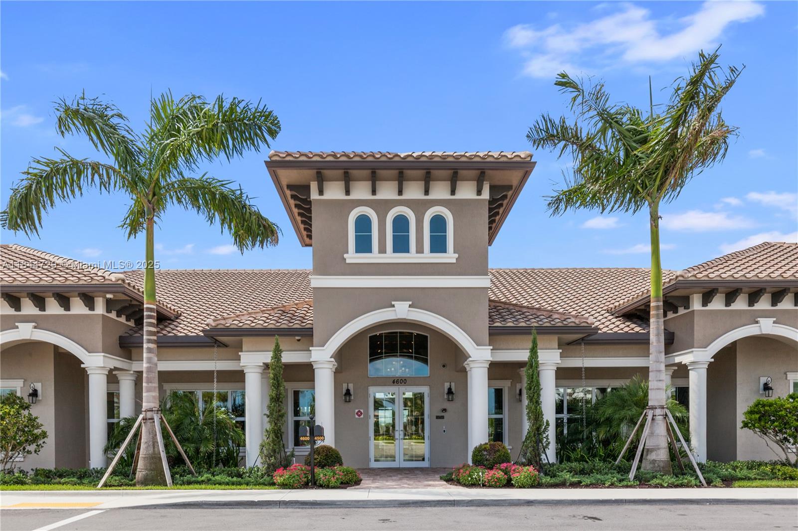 4950 Eucalyptus Drive, Unit 4 Hollywood, FL 33021 - Photo 19 of 25 a front view of a house with garden