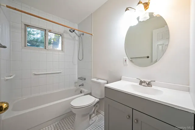 a view of a park with large trees