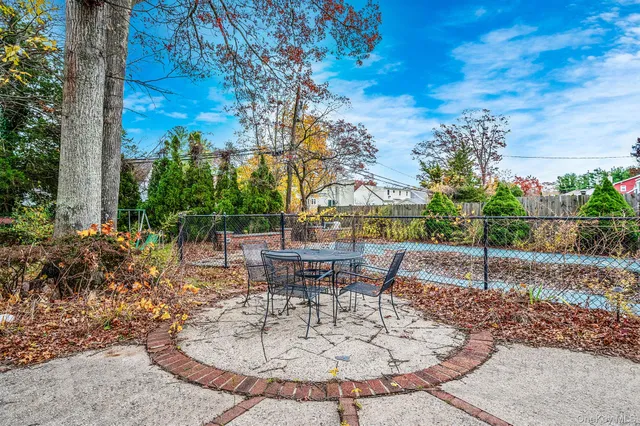 a view of swimming pool with a yard