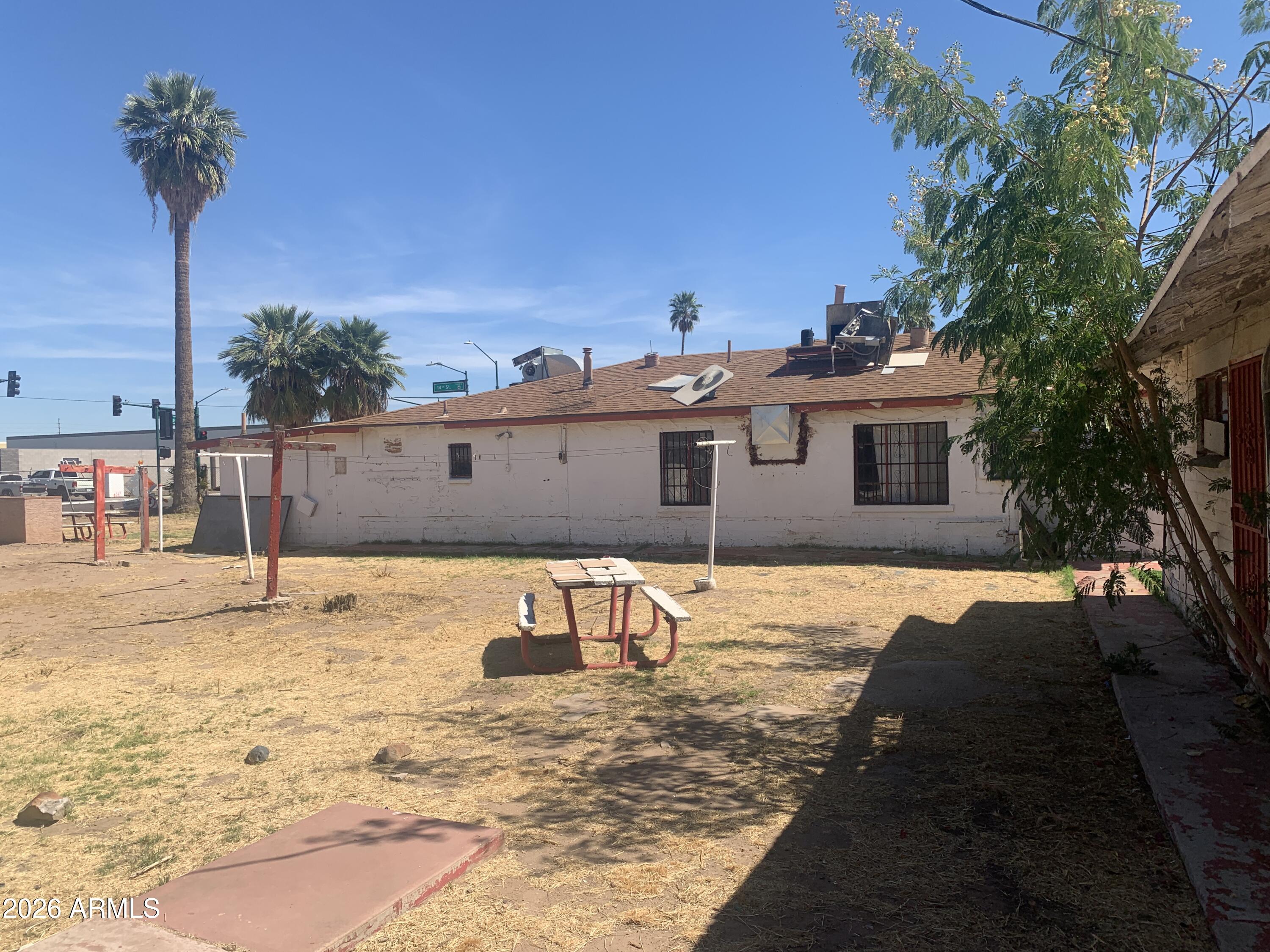 1202 South 14th Street Phoenix, AZ 85034 - Photo 16 of 44 a house view with a outdoor space
