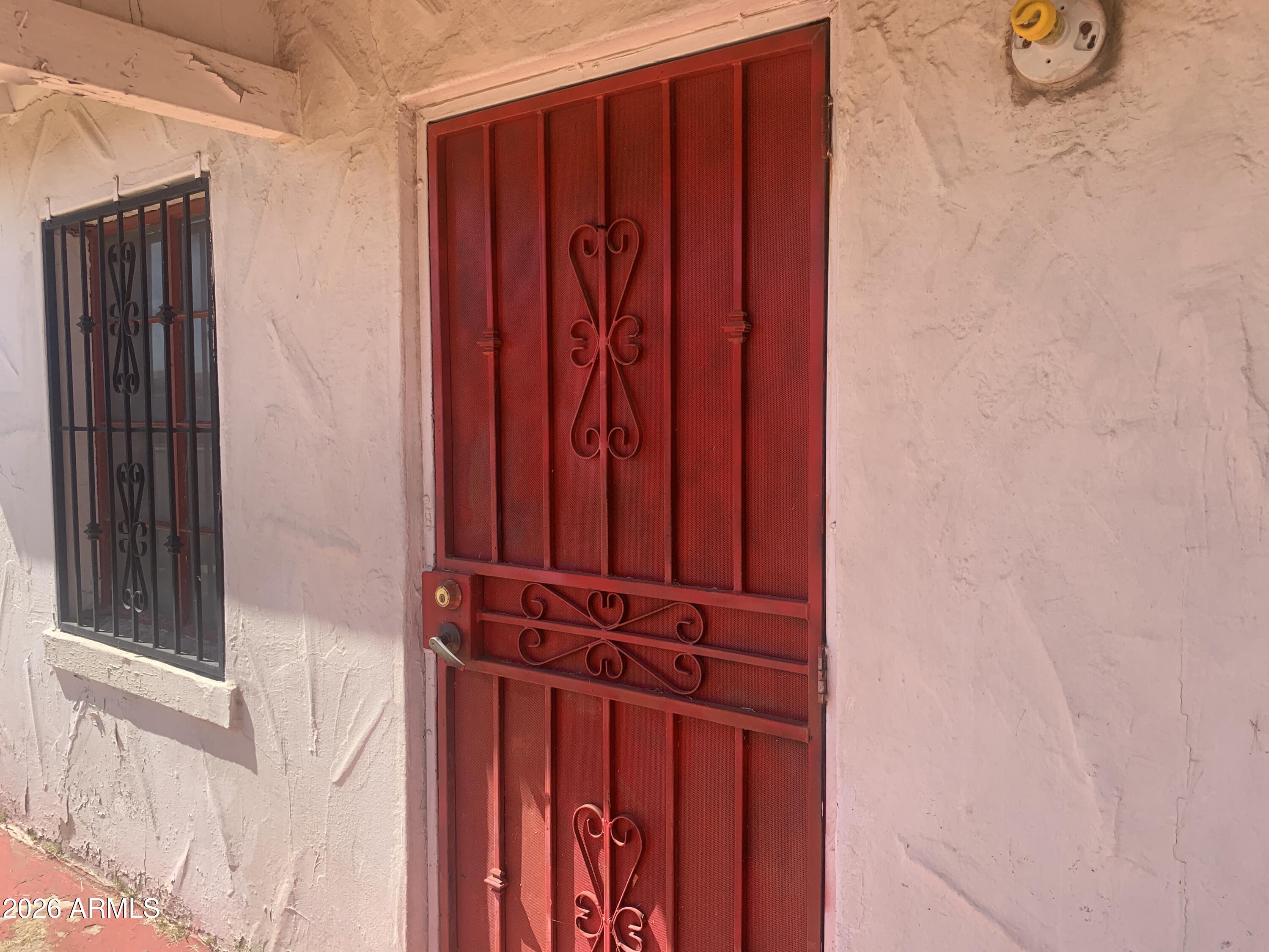 1202 South 14th Street Phoenix, AZ 85034 - Photo 26 of 44 a view of a wooden door