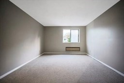 30 High Street, Unit 209 Dedham, MA 02026 - Photo 22 of 28 an empty room with windows