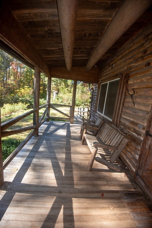 217 Nichols Road Barre, MA 01005 - Photo 28 of 41 a view of a porch with wooden floor