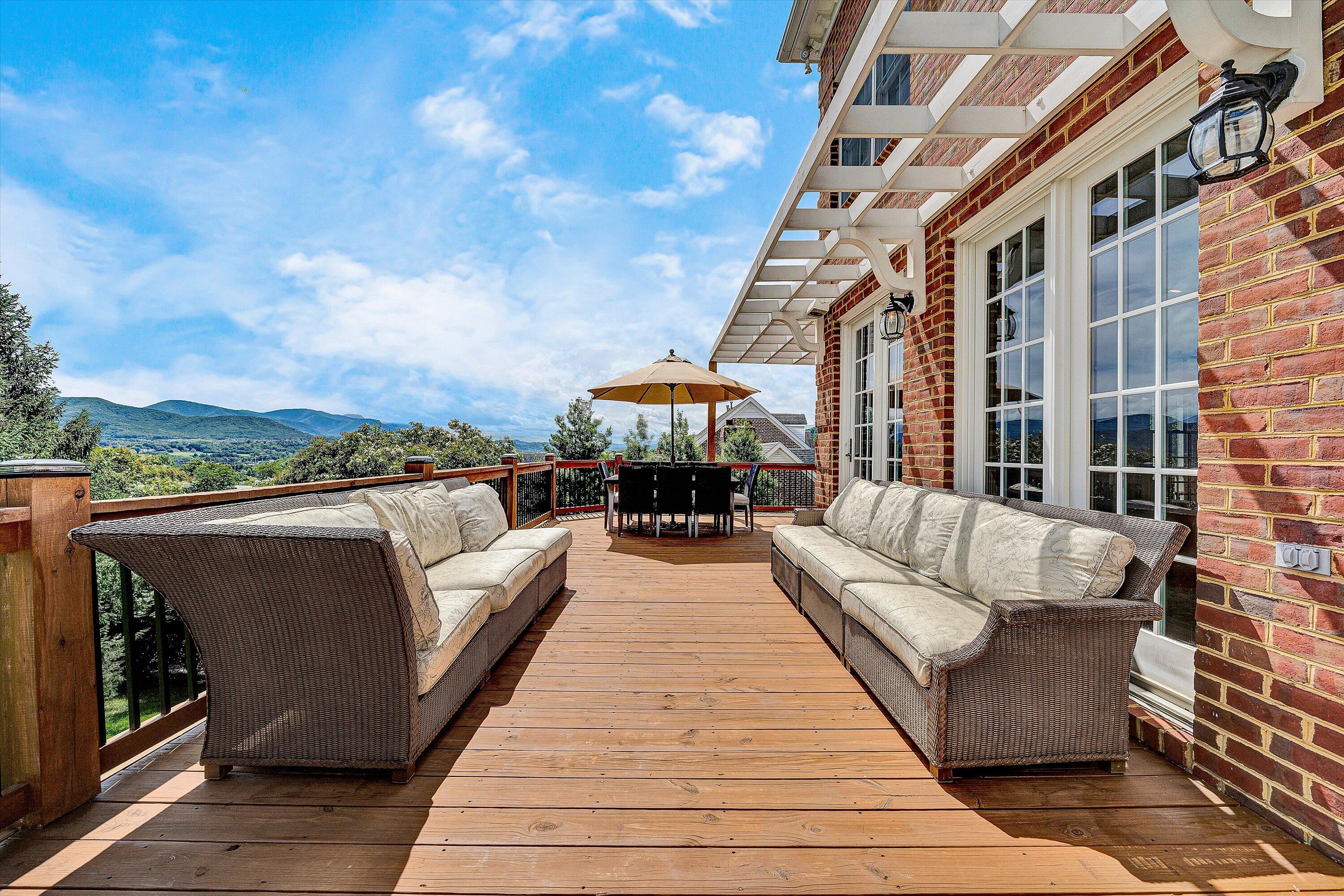 824 Pendleton Drive Salem, VA 24153 - Photo 13 of 78 a view of a roof deck with couches and potted plants