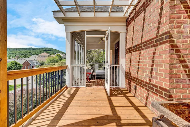 a kitchen with stainless steel appliances granite countertop a sink and wooden cabinets