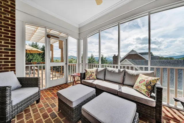 a kitchen with stainless steel appliances granite countertop a refrigerator a sink a stove and island