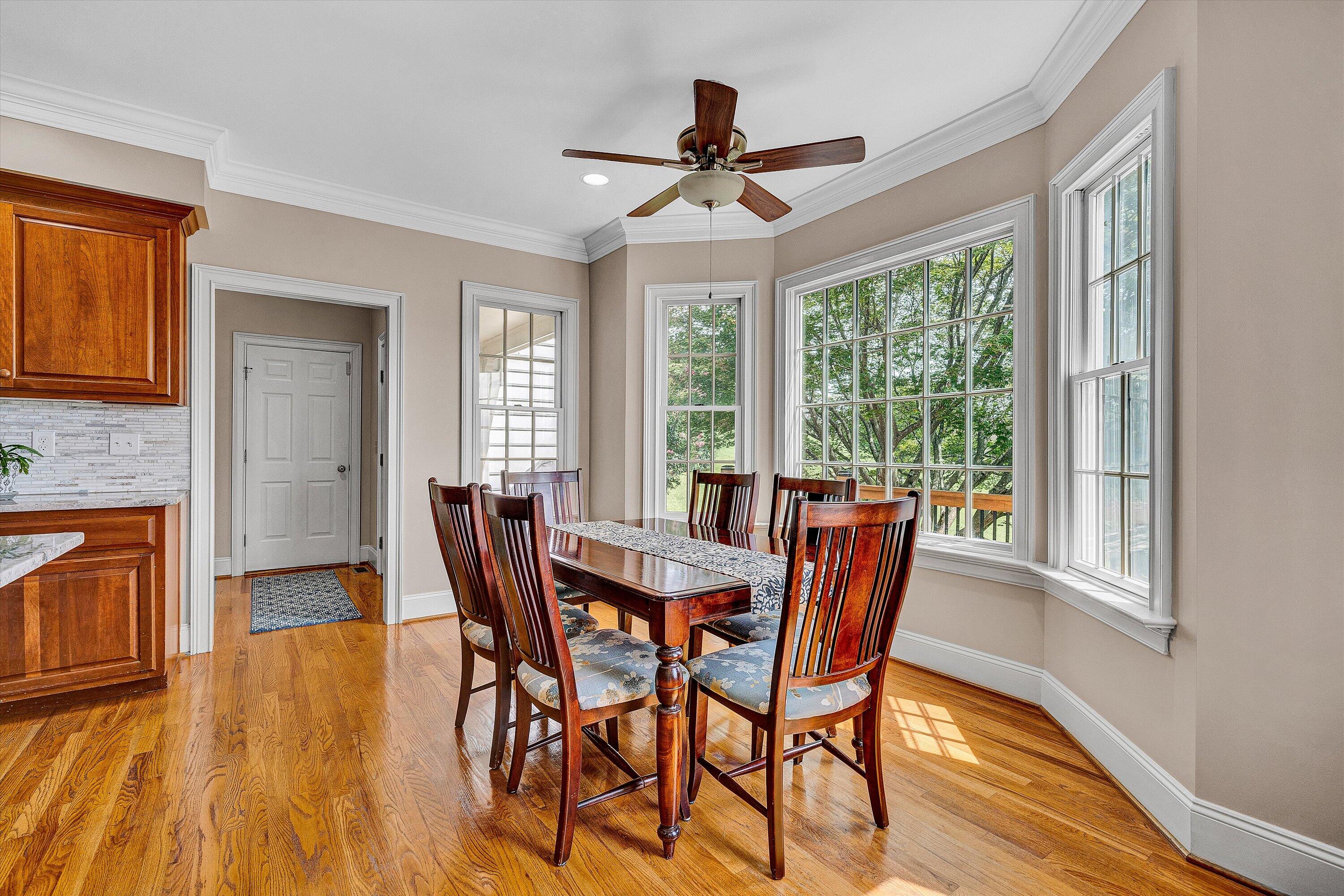 824 Pendleton Drive Salem, VA 24153 - Photo 20 of 78 a view of a dining room with furniture window and wooden floor