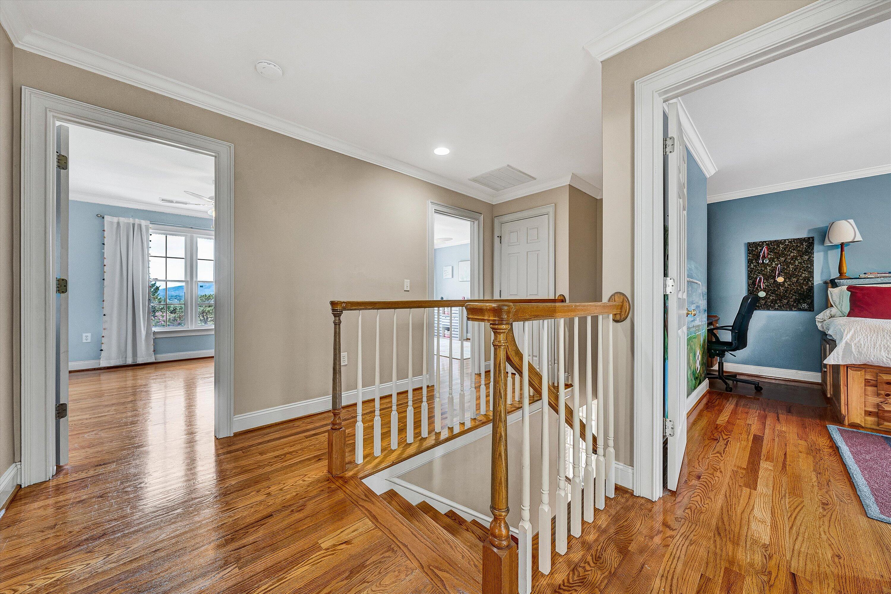 824 Pendleton Drive Salem, VA 24153 - Photo 30 of 78 a view of a hallway with wooden floor and dining room