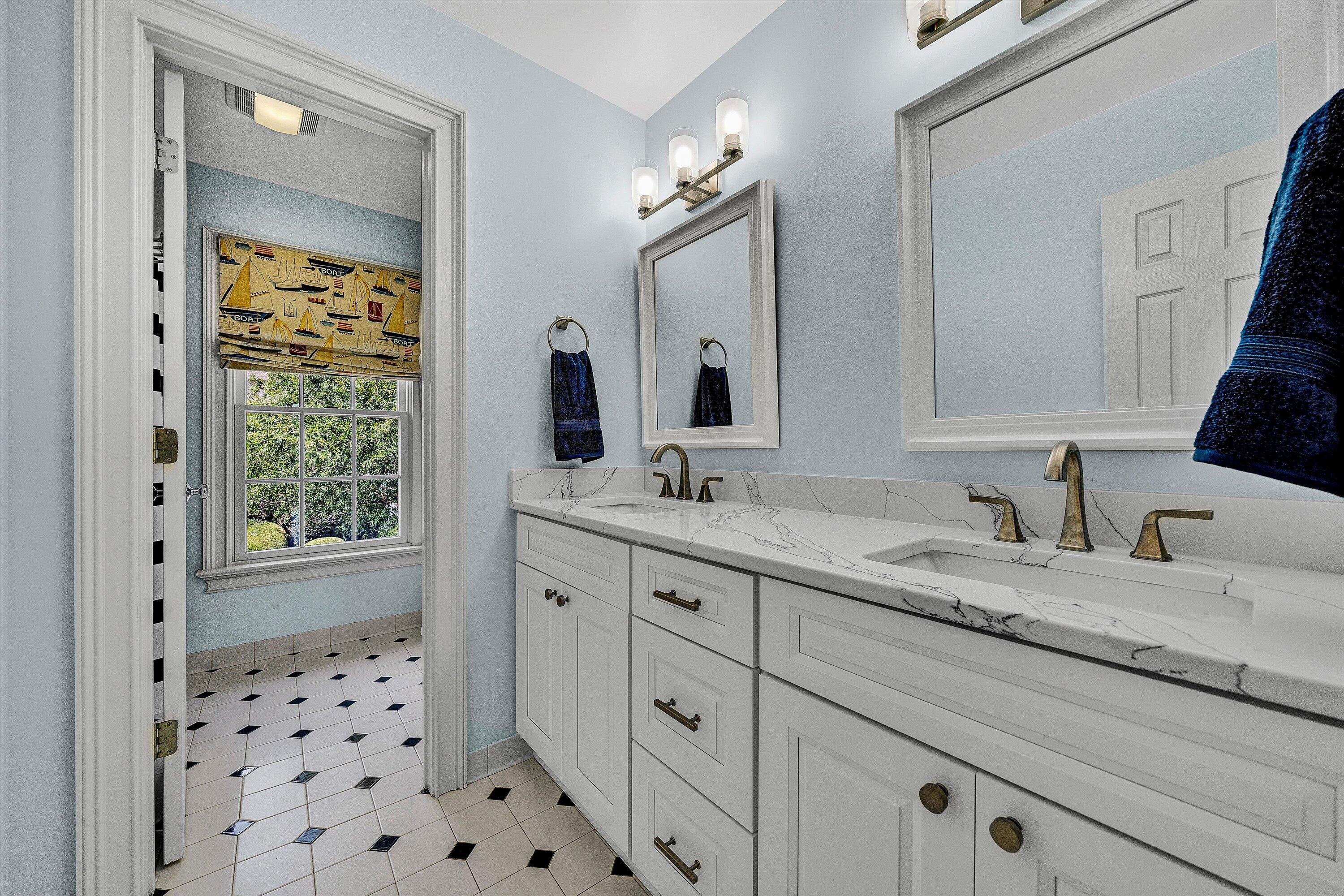 824 Pendleton Drive Salem, VA 24153 - Photo 33 of 78 a bathroom with a sink a vanity and a mirror