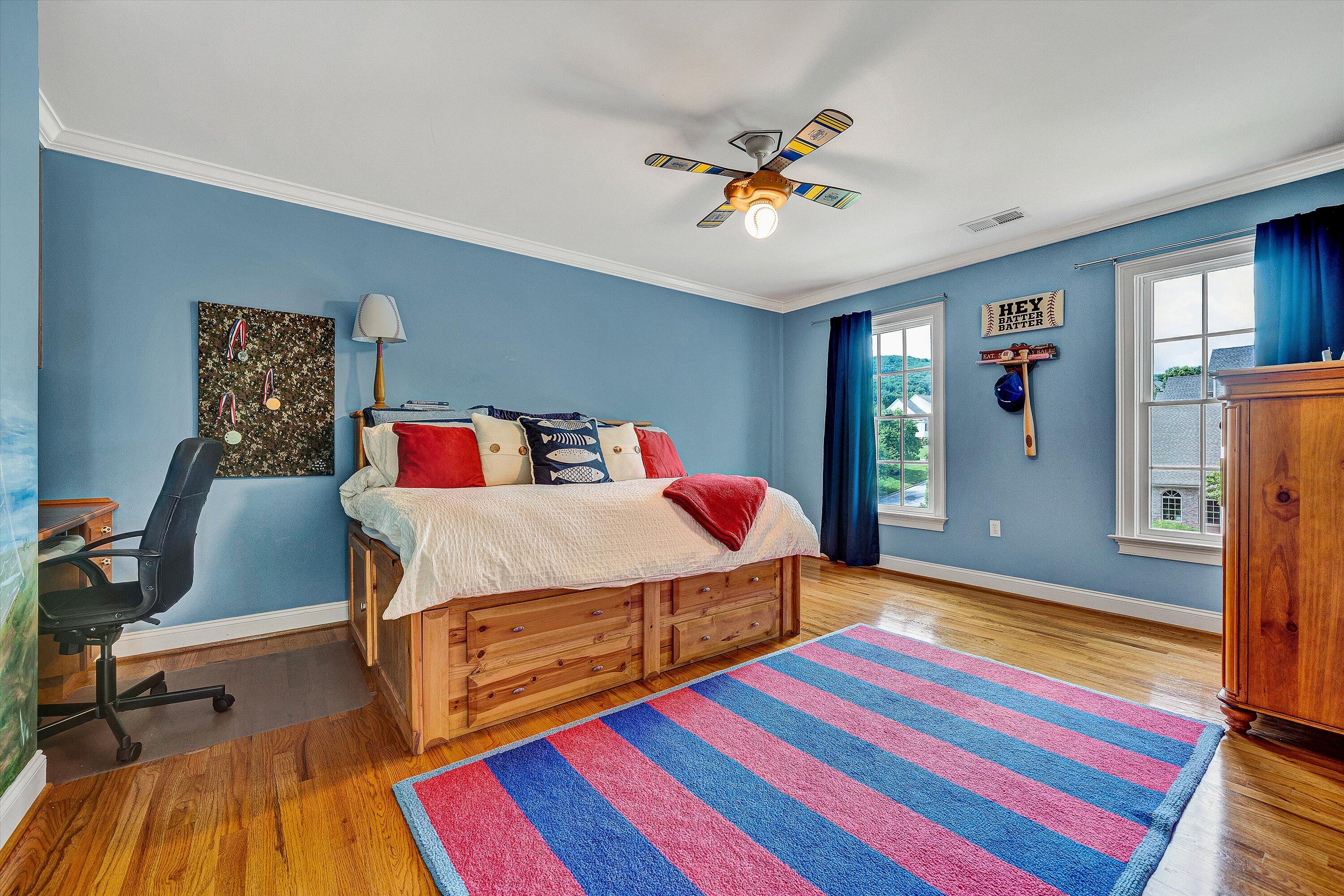824 Pendleton Drive Salem, VA 24153 - Photo 35 of 78 a bedroom with a bed and wooden floor