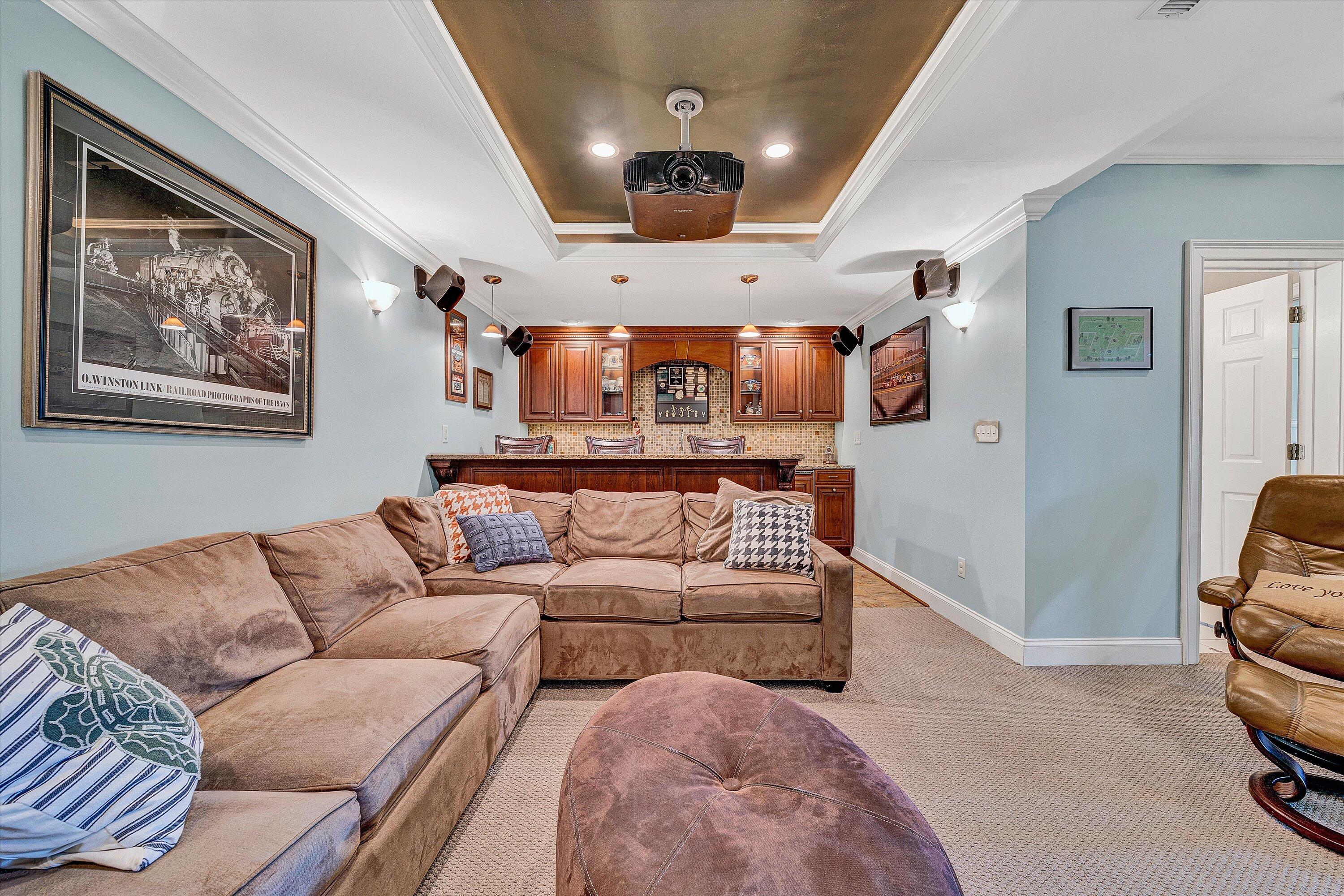 824 Pendleton Drive Salem, VA 24153 - Photo 58 of 78 a living room with furniture and a chandelier