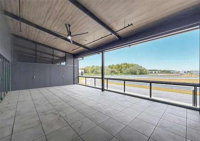 an empty room with windows