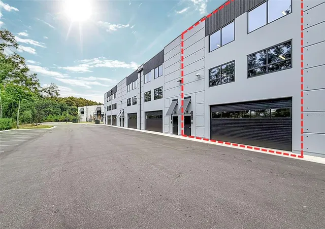 a view of a building with a street