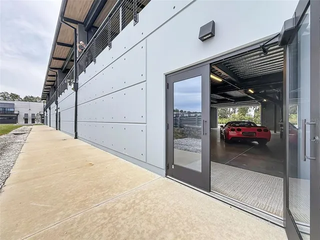 a view of a glass door with a balcony
