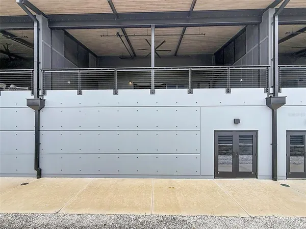 a view of an empty room with a windows
