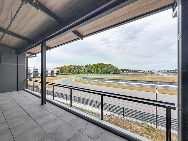 a view of an empty room with a sliding door