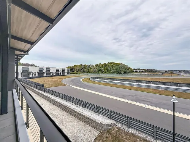 a view of an empty room with a sliding door
