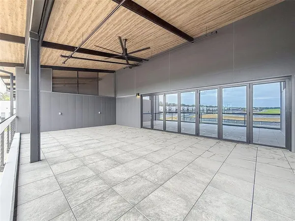 a view of an empty room with a fireplace