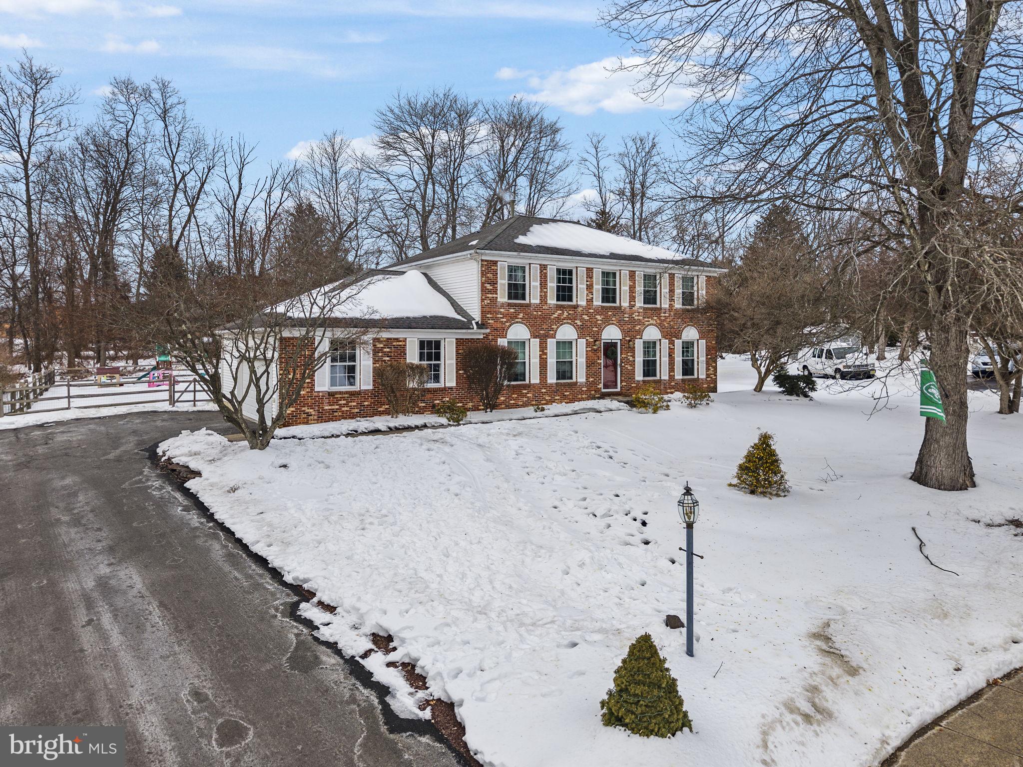 4 Birch Run Court Ewing, NJ 08628 - Photo 1 of 57 a front view of a house with a yard