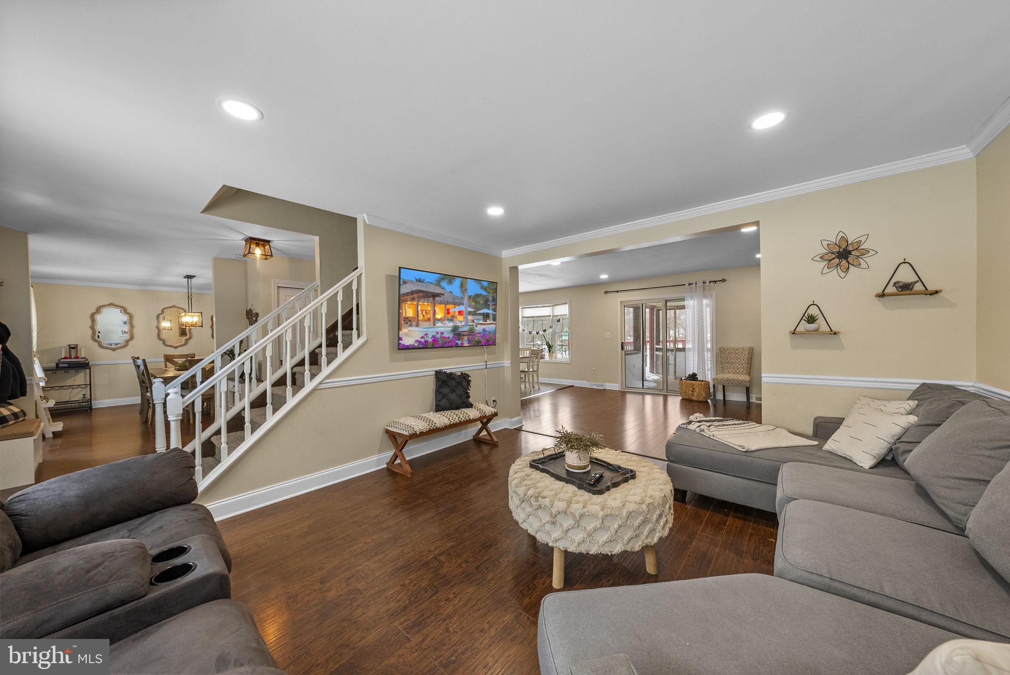 4 Birch Run Court Ewing, NJ 08628 - Photo 12 of 57 a living room with furniture and stairs