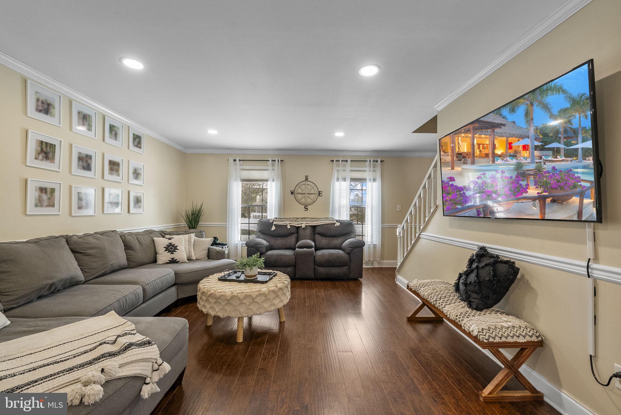 4 Birch Run Court Ewing, NJ 08628 - Photo 13 of 57 a living room with furniture and a flat screen tv