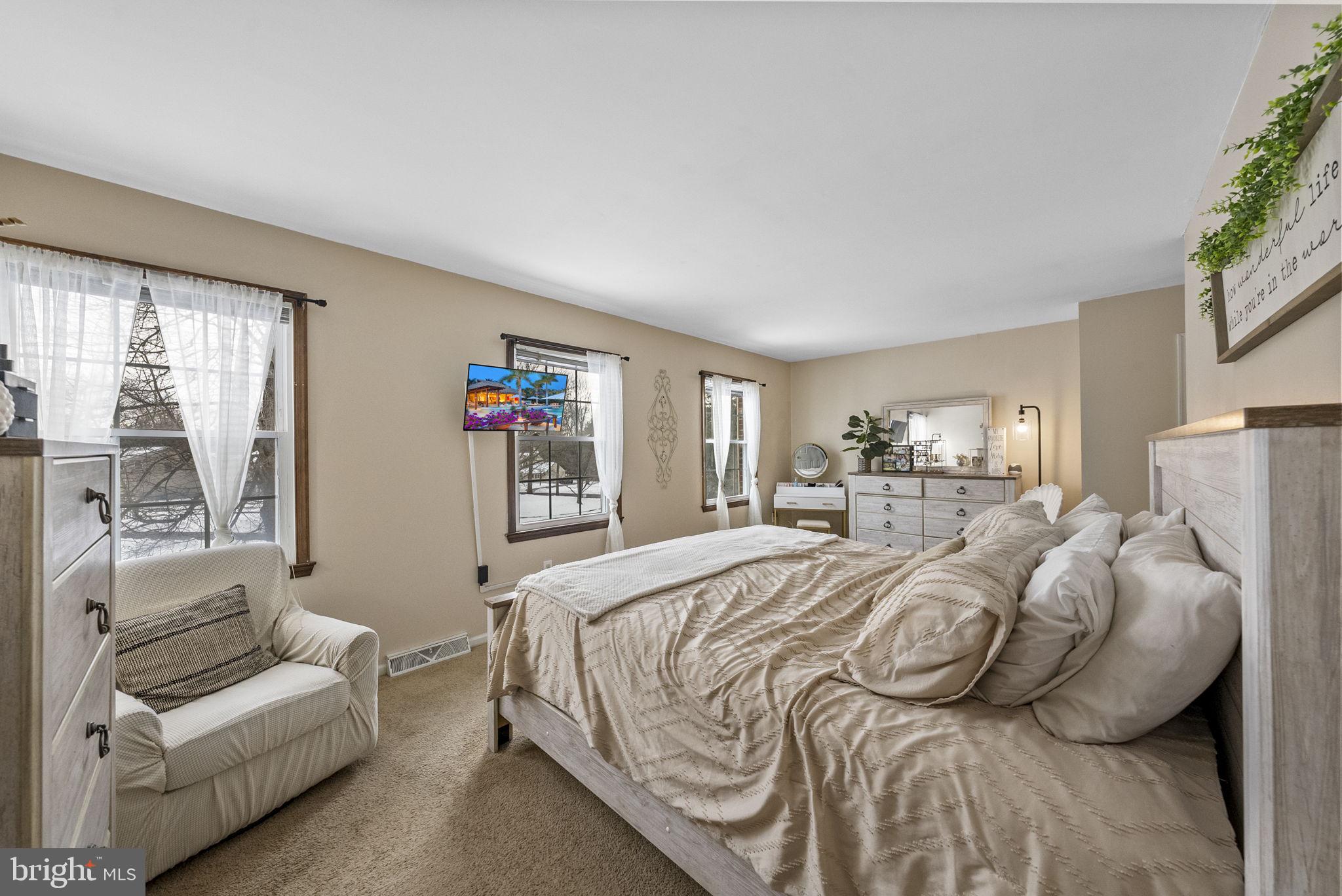 4 Birch Run Court Ewing, NJ 08628 - Photo 32 of 57 a bedroom with a bed and a couch