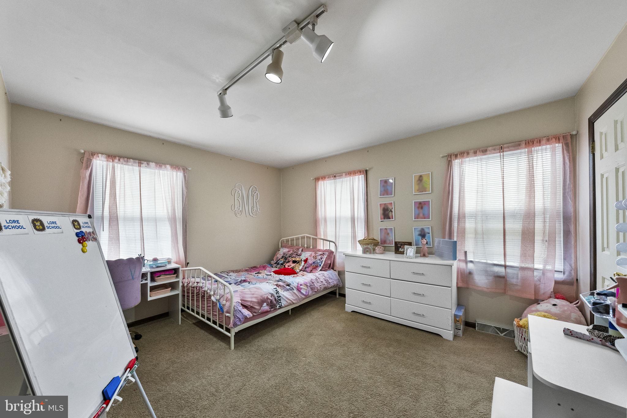 4 Birch Run Court Ewing, NJ 08628 - Photo 33 of 57 a bedroom with bed and large windows