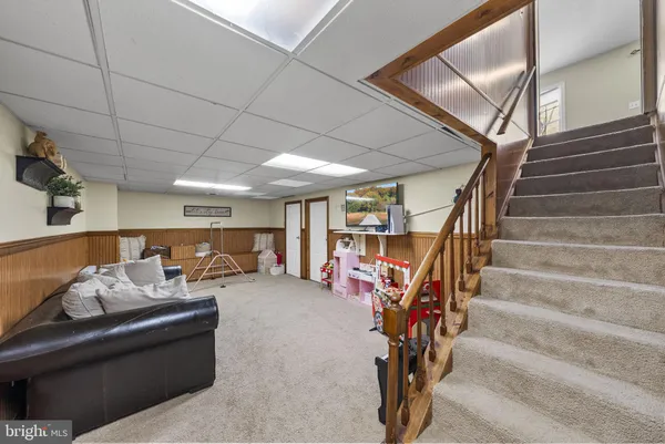 a view of a dining room with furniture large window and outside view