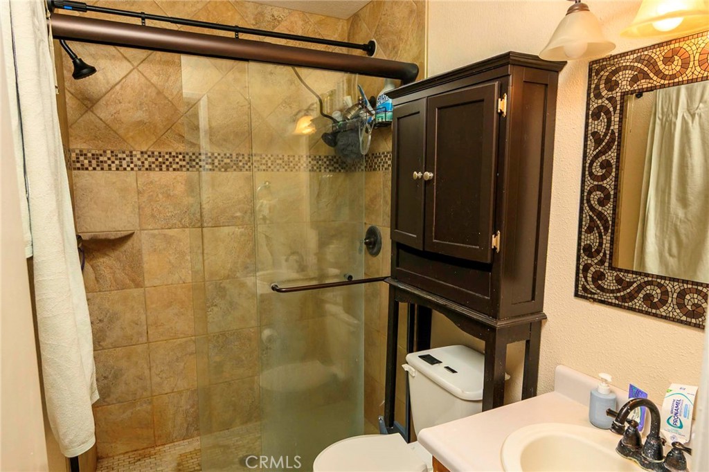 171 Brisco Road, Unit 8 Arroyo Grande, CA 93420 - Photo 5 of 23 Tiled walk-in shower. Tiled flooring