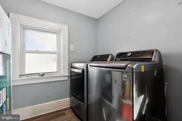a utility room with dryer and washer