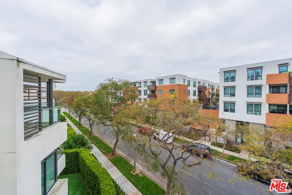 a view of a balcony with an outdoor space