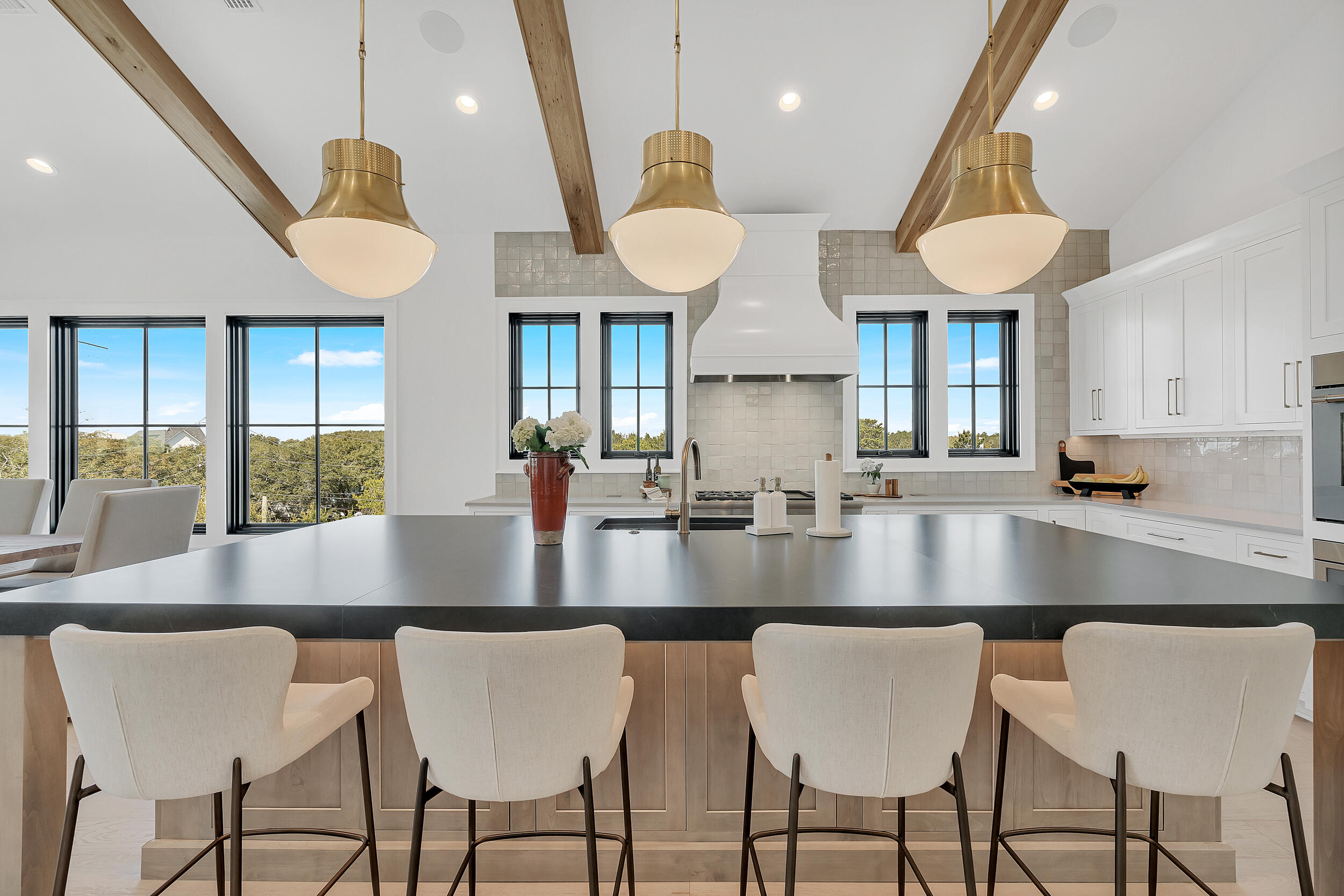 7843 East County Highway 30A Inlet Beach, FL 32461 - Photo 14 of 71 a view of a dining room with furniture and wooden floor