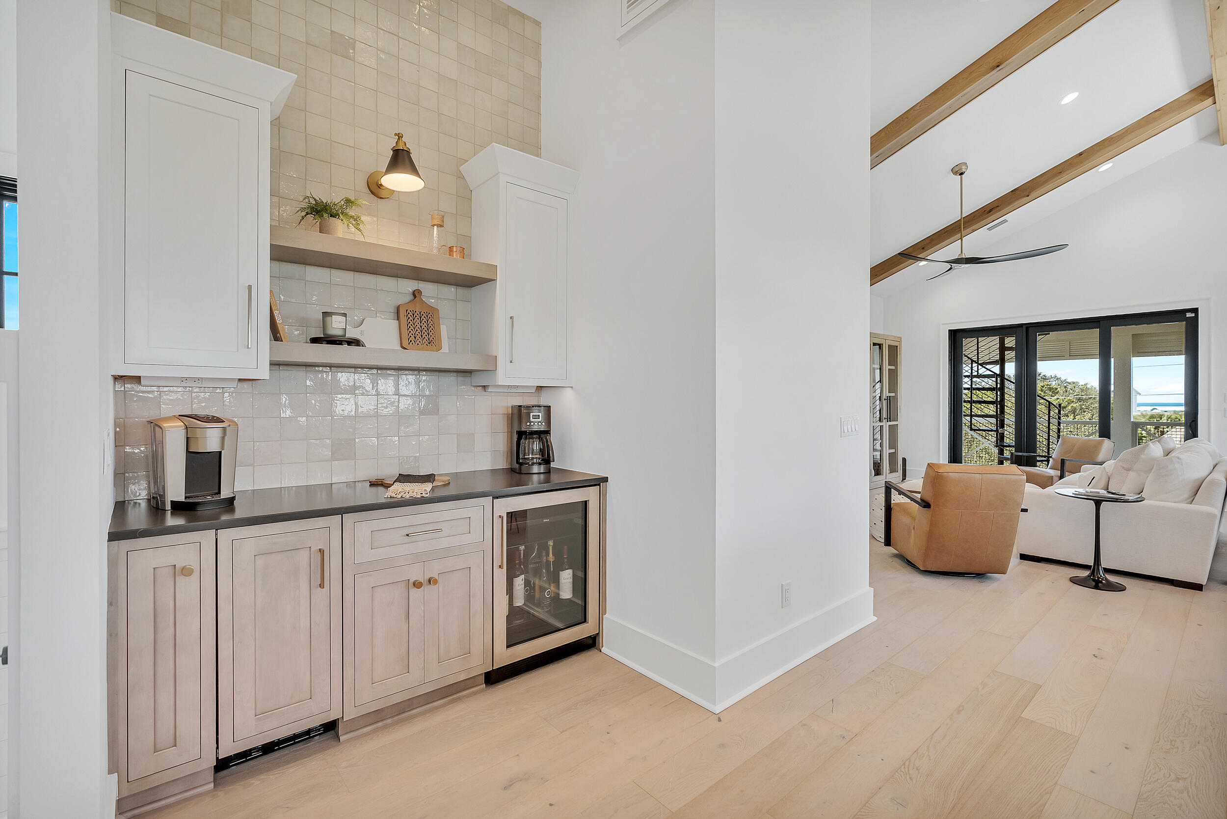 7843 East County Highway 30A Inlet Beach, FL 32461 - Photo 18 of 71 a kitchen with cabinets a sink and a stove next to a window