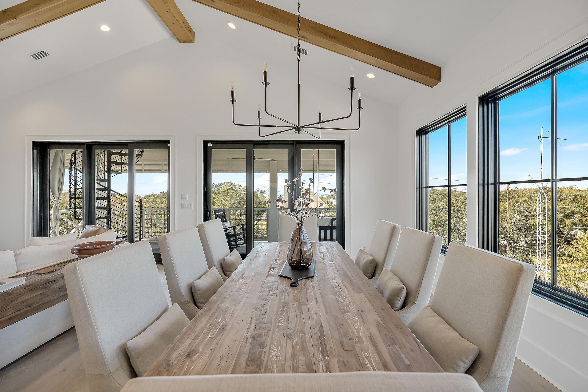 7843 East County Highway 30A Inlet Beach, FL 32461 - Photo 19 of 71 a living room with furniture large windows wooden floor and windows