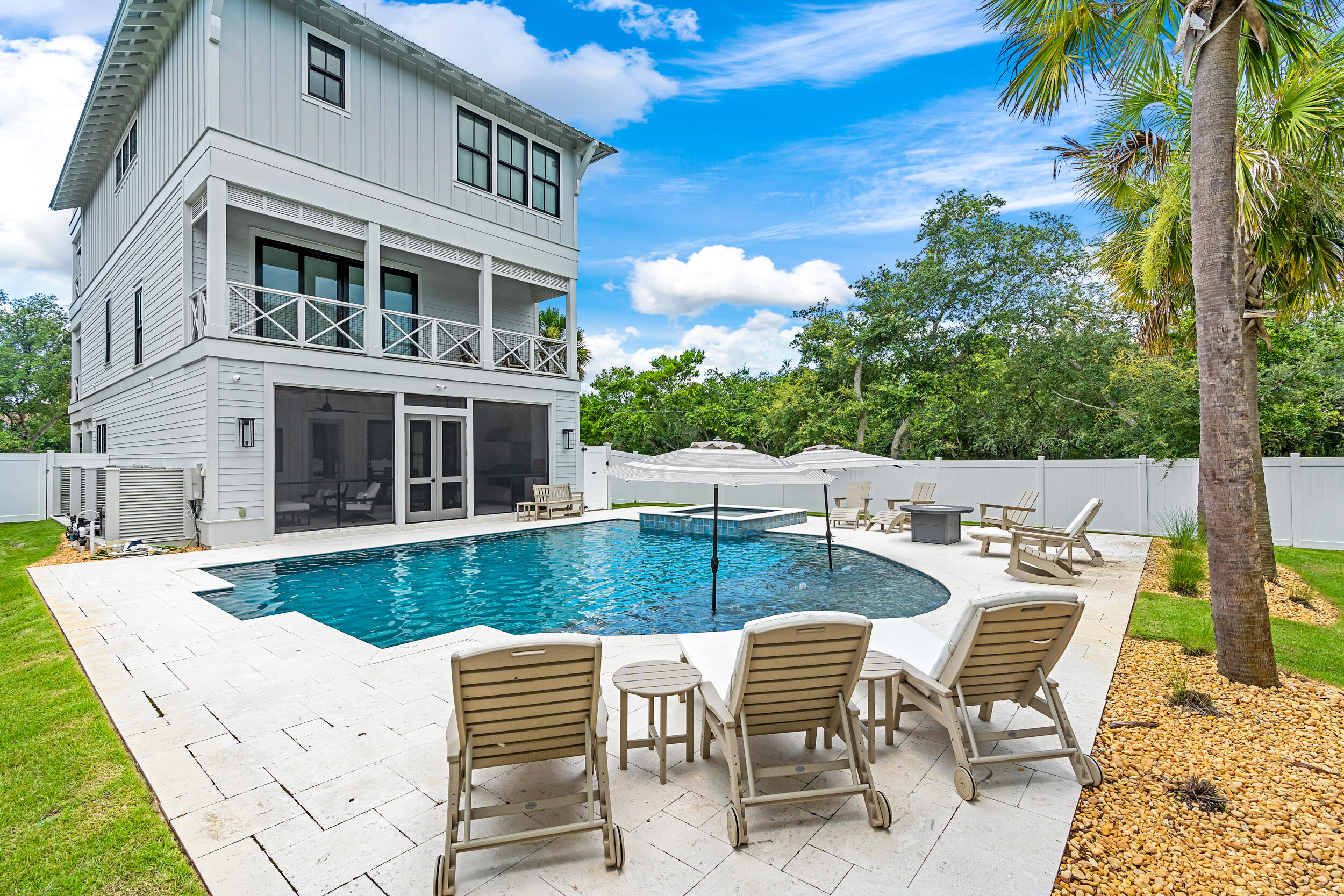 7843 East County Highway 30A Inlet Beach, FL 32461 - Photo 59 of 71 a view of a patio with a table and chairs