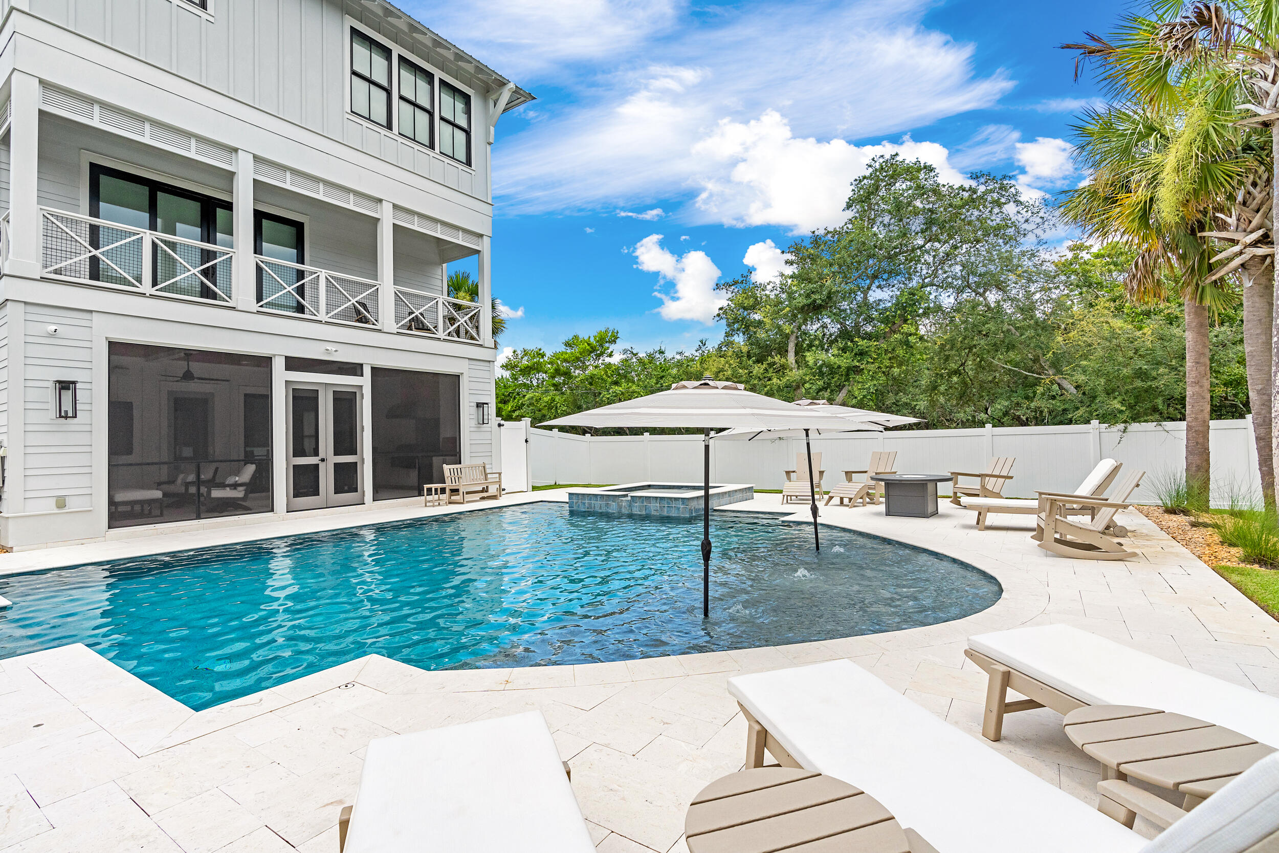 7843 East County Highway 30A Inlet Beach, FL 32461 - Photo 62 of 71 a view of a house with swimming pool and sitting area